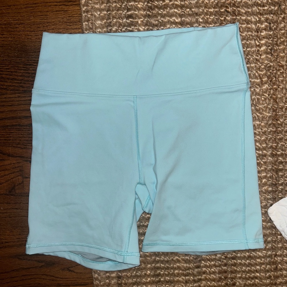 M high waisted light blue 6” biker shorts. Fabletics, like new. Medium